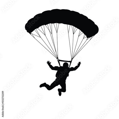 silhouette of a paraglider