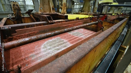 Potassium salt flotation in basin with liquid at plant