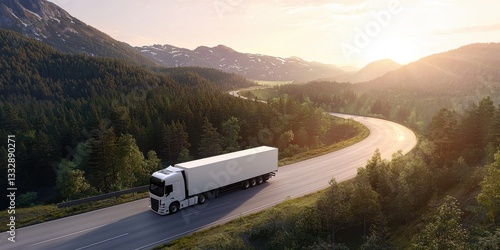 A white truck travels along a winding highway through a lush forest. 