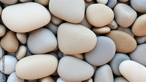 Sea pebble texture in sand light shades