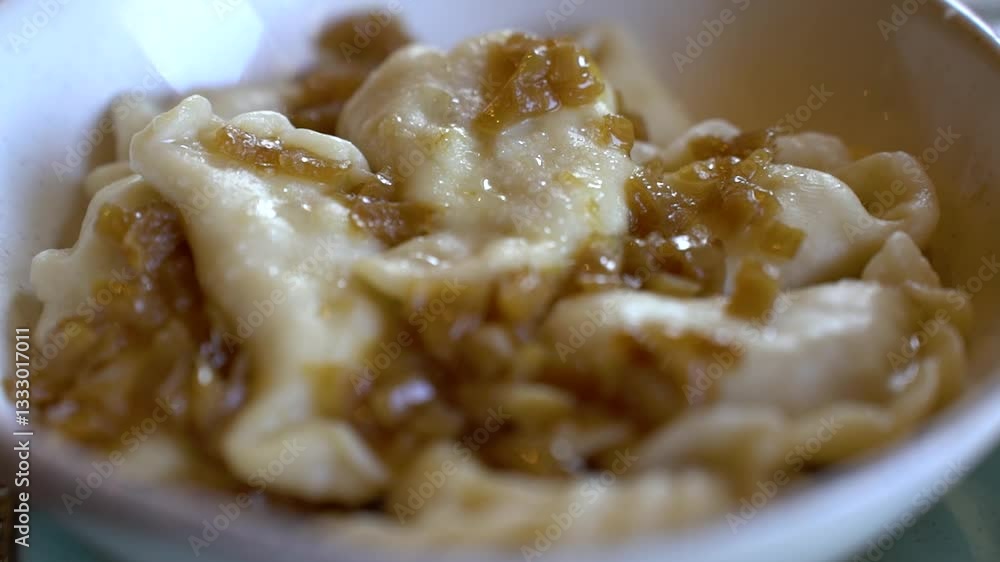 Video of traditional Ukrainian dish - varenyki with potatoes and caramelized onions Video of traditional Ukrainian dish - varenyki with potatoes and caramelized onions