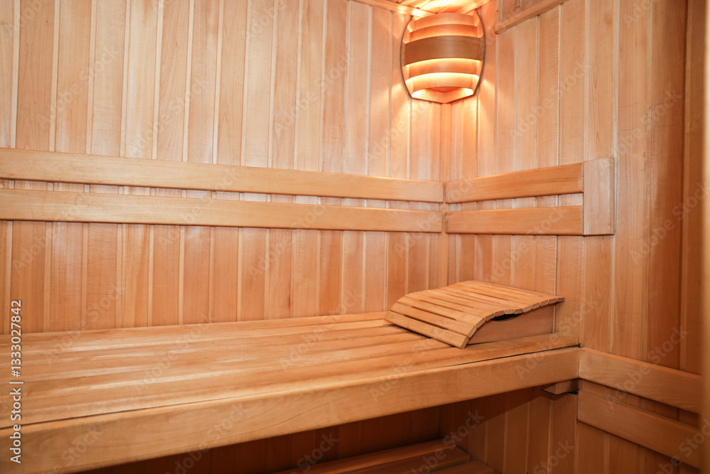 View of empty wooden sauna with bench View of empty wooden sauna with bench