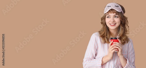 Young woman in pajamas and ...