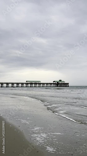The pier at Folly Beach on a cloudy day