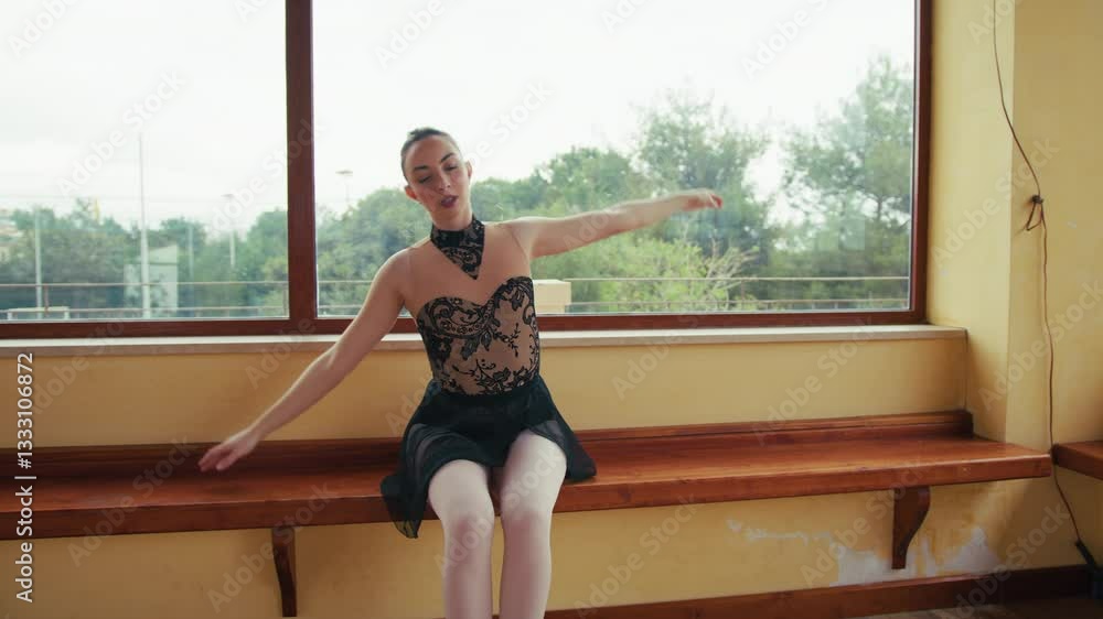 Ballet Dancer in Elegant Performance Pose Ballet Dancer in Elegant Performance Pose