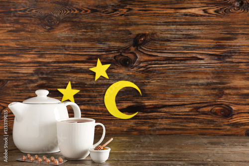 Cup and teapot of tea with ...