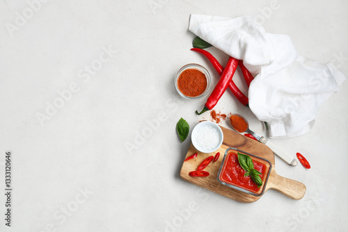 Glass bowl of tomato sauce ...