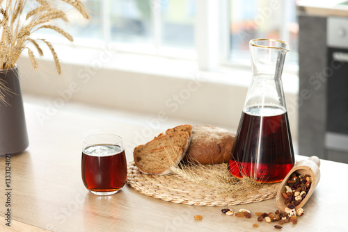 Jug and glass of tasty kvas...