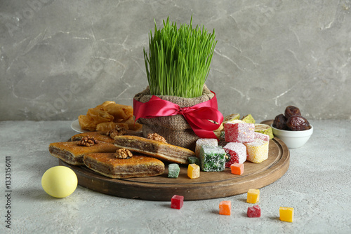 Board with green wheat gras...
