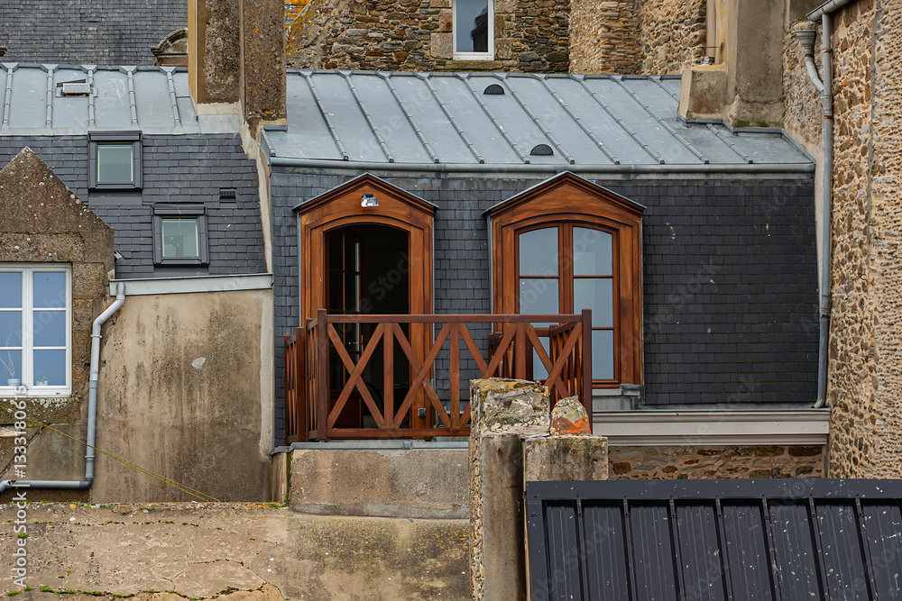 Architecture of ancient city Saint-Malo, a walled port city in Brittany (prefecture Ille-et-Vilaine) in northwestern France on English Channel. Saint-Malo. France.