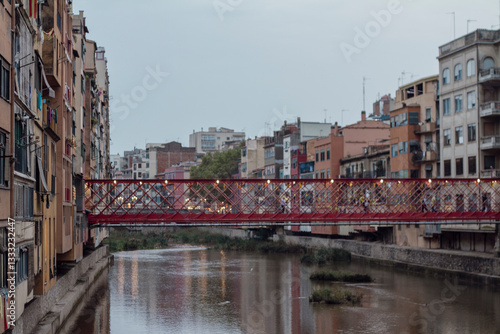 Bild auf Leinwand Eiffel Bridge, The Iconic Red Metal Pedestrian Bridge Over the Onyar River in Gi
