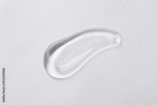 Фотография Sample of cosmetic product isolated on white, top view