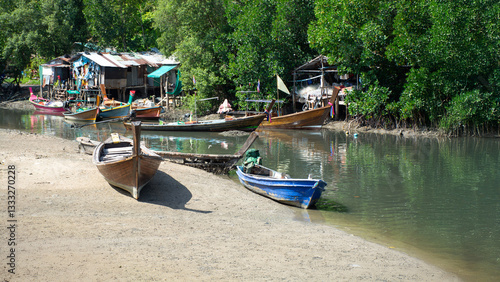 Obraz na płótnie Thai Fishing Village: Life on the Riverbank w salonie