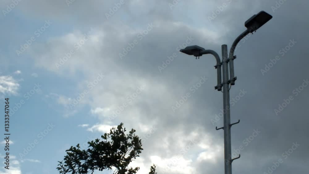 Looking up at the sky, there were stunning dark clouds rolling across the sky. The heavy rain will come soon. Looking up at the sky, there were stunning dark clouds rolling across the sky. The heavy rain will come soon.