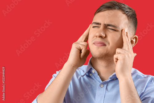 Young man suffering from he...