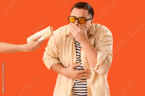 Young man refusing hand wit...