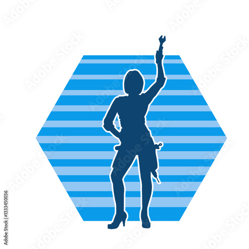 Silhouette of a sexy female worker holding a wrench tool. Silhouette of a woman repairer in action pose with her tool.