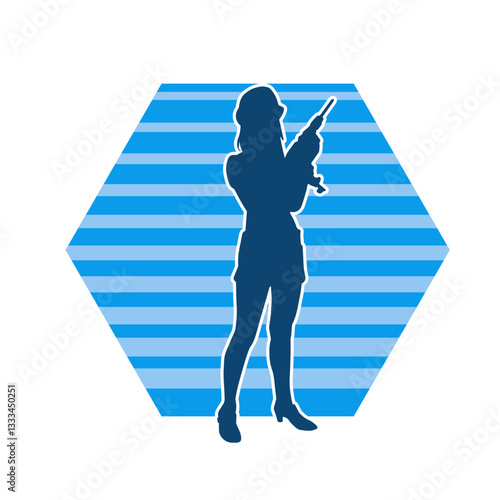 Silhouette of woman in construction worker costume carrying drill power tool. Silhouette of construction worker female in action pose with power tool driller. 