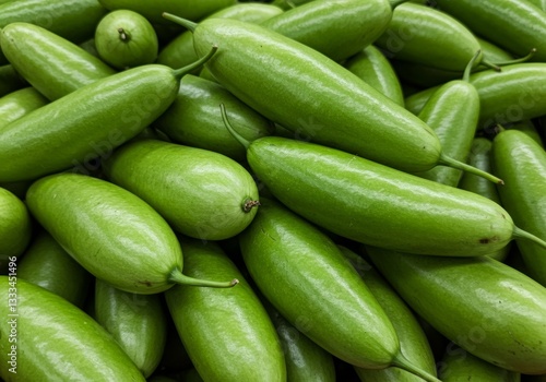 Heap of Fresh Green Bottle Gourds Ready for Culinary Use