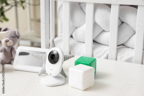 Baby monitor with toys on t...