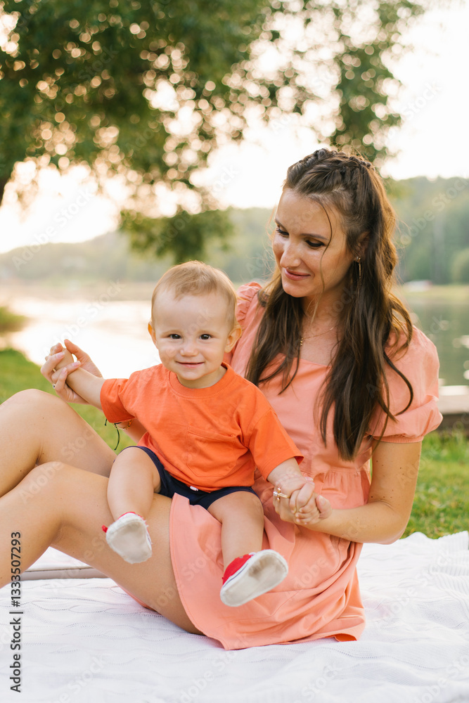 Smiling Baby And Mother At Picnic