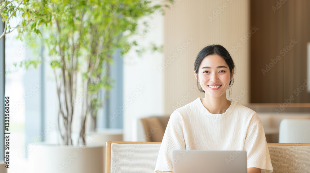 Digital Nomad Productivity in Remote Work Lifestyle, Smiling woman working on laptop in modern office Digital Nomad Productivity in Remote Work Lifestyle, Smiling woman working on laptop in modern office