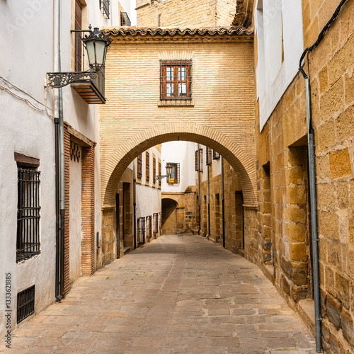 Beautiful stone village with arches in the narrow streets in Baeza, a World Heritage Site