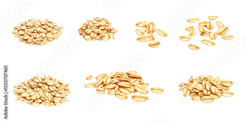 Piles of raw rolled oats scattered in small groups across a plain transparent background ready for healthy breakfast promotion.