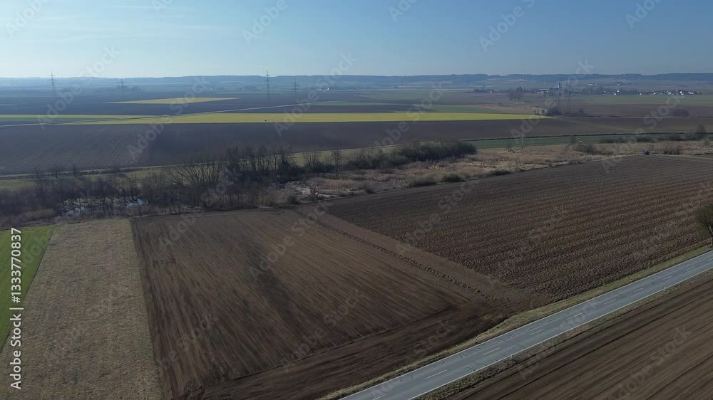 Drone view captured in flight at an old tree near Wisselsing, Osterhofen, Deggendorf, Bavaria, Germany Drone view captured in flight at an old tree near Wisselsing, Osterhofen, Deggendorf, Bavaria, Germany