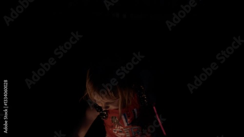 Little Patriot Playing with a Sparkler Firework.