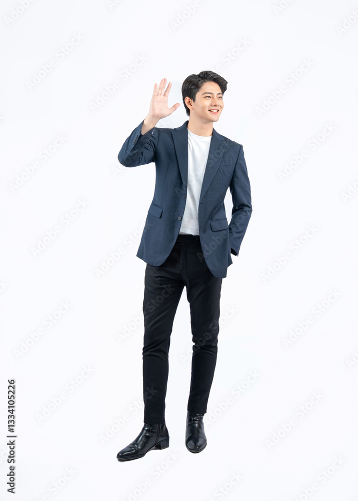Full body image of a young Asian business man posing on a white background Full body image of a young Asian business man posing on a white background