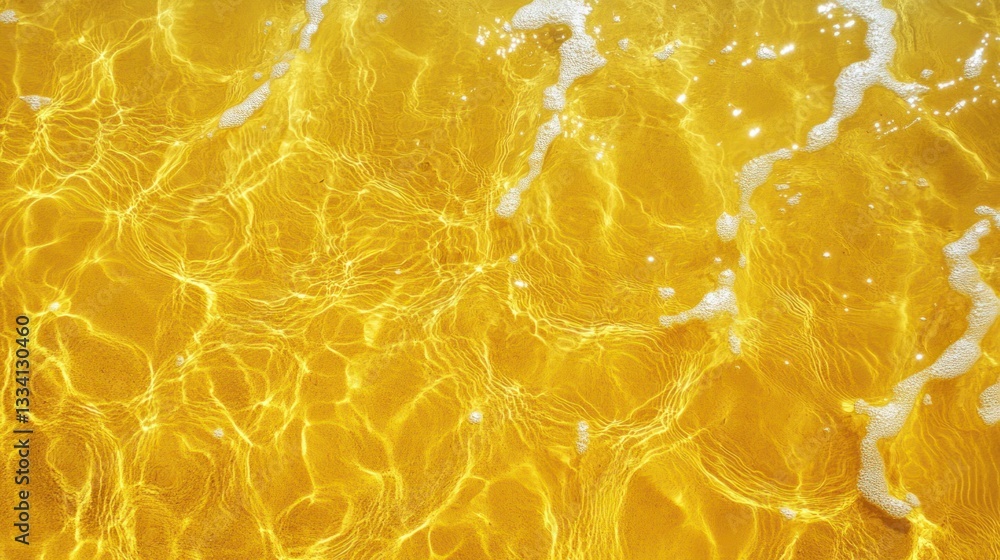 Textured golden water with white foam and light reflections on the surface Textured golden water with white foam and light reflections on the surface
