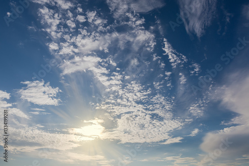 Photography Blue sky with stratocumulus and cirrus clouds backlit