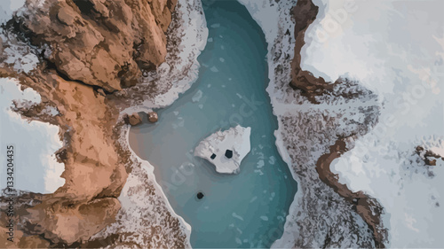 The image is a high-angle, aerial shot of a glacial river partially frozen over. The river is a vibrant turquoise color, contrasting with the surrounding snow and rock formations.  The rocks are