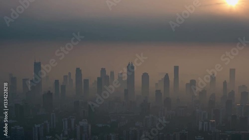 Wallpaper Mural Eerie Smoggy Skyline at Dusk with Urban Structures and Soft Sunlight Glimmering Through Haze Torontodigital.ca