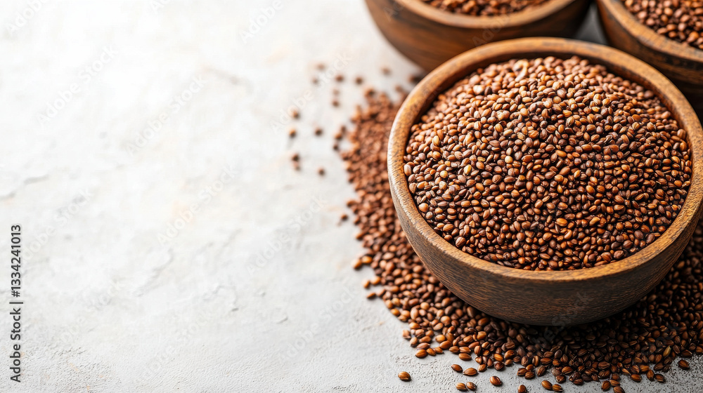 bowl of seeds on clean background with scattered seeds bowl of seeds on clean background with scattered seeds