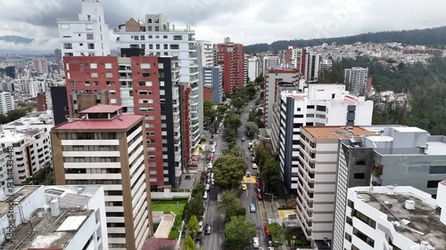 Aerial footage of the city Quito in Ecuador with the Volcan mountain on background