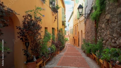 POV shot while walking through narrow street of Menton, Cote dAzur, France