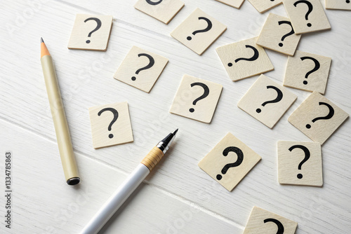 Wallpaper Mural Question Mark Blocks with Pencil and Pen on Light Background for Creative Brainstorming Ideas Torontodigital.ca