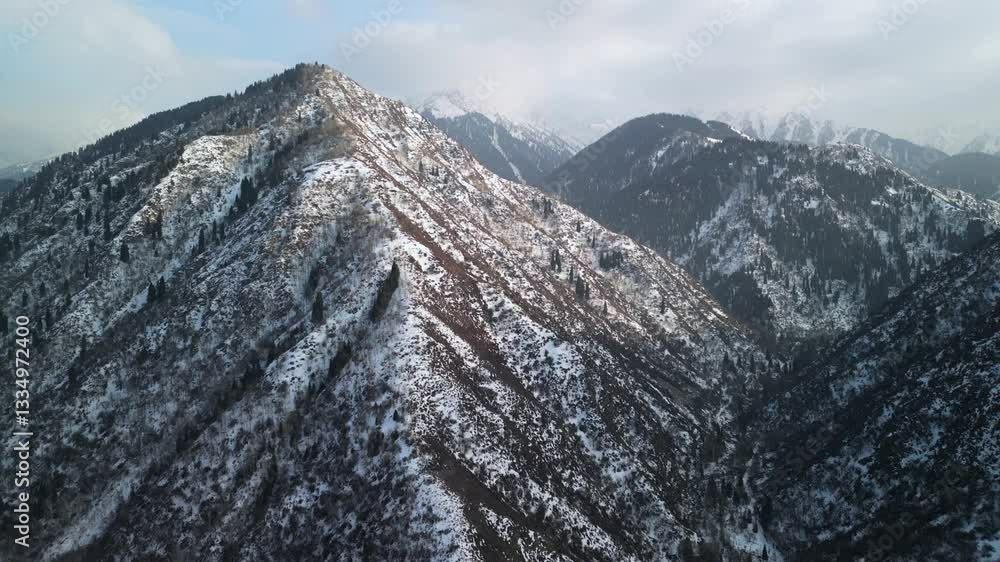 Talgar gorge. Tien Shan Mountains, Ile-Alatau Nature Park. Mountainous area with different vegetation. The view from the drone.