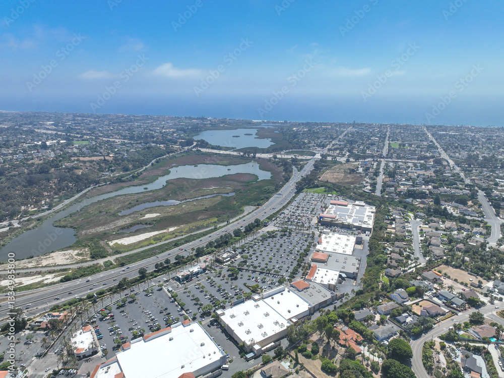 Aerial view of middle class houses in the valley of Oceanside town in San Diego, California. USA.