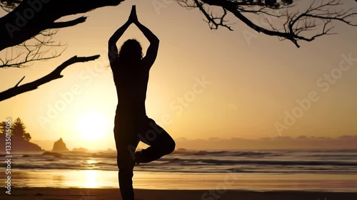 Wallpaper Mural Silhouette of Woman in Tree Pose Yoga at Sunset Beach: Mindfulness, Meditation, Wellness, and Serenity in Nature Torontodigital.ca