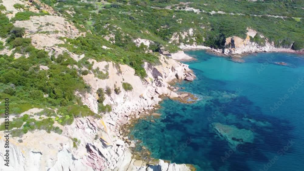 Southern shore of Cala Cumpultittu on a sunny day. Sardinia, Italy Southern shore of Cala Cumpultittu on a sunny day. Sardinia, Italy