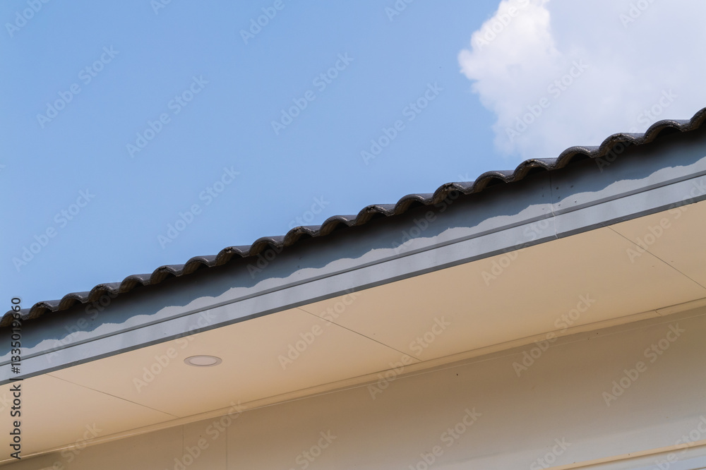 Obraz premium Residential roof edge detail urban setting architectural image bright conditions close-up view