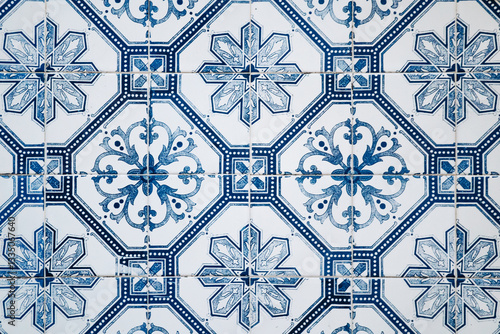Close-up of traditional azulejo tiles on a historic facade in downtown Lisbon