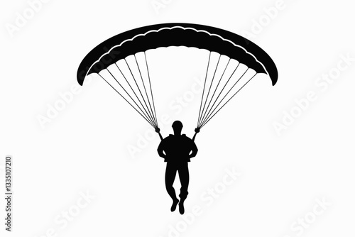silhouette of a paraglider