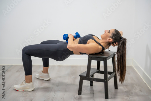 Принти на полотні Hip thrust exercise with dumbbells for strengthening glutes, core, and lower bod