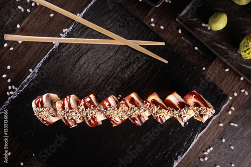 Appetizing sushi served with wasabi on a dark background in elegant restaurant style. Perfect for menu design, Japanese cuisine, gourmet dining, and food photography.