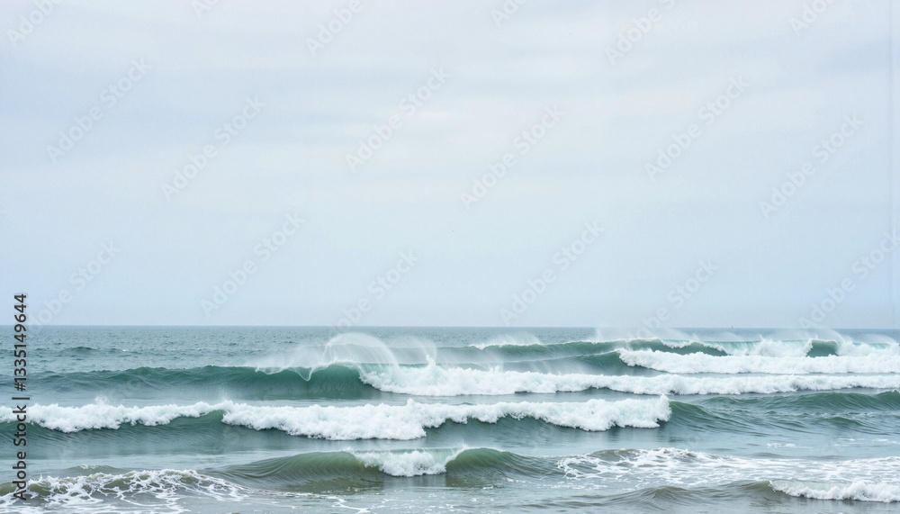 Fototapeta premium Wild waves crashing on a windy day at the beach, nature's power