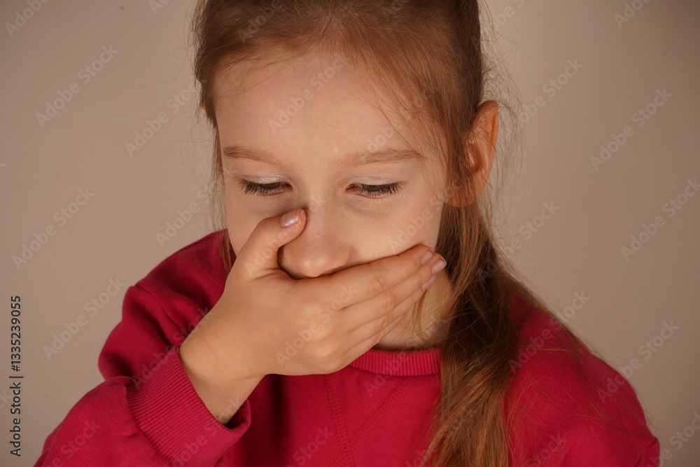 Her body language conveys a raw, startled emotion. A genuine and tender depiction of fear. A frightened girl with a ponytail places her hand over her mouth, as if silencing herself from surprise. Her body language conveys a raw, startled emotion. A genuine and tender depiction of fear. A frightened girl with a ponytail places her hand over her mouth, as if silencing herself from surprise.